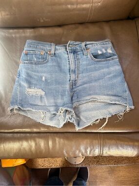 0003. Levi's Light Blue Distressed Denim Cutoff Shorts